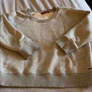 Heather grey distressed sweatshirt. 3/4 sleeves.
